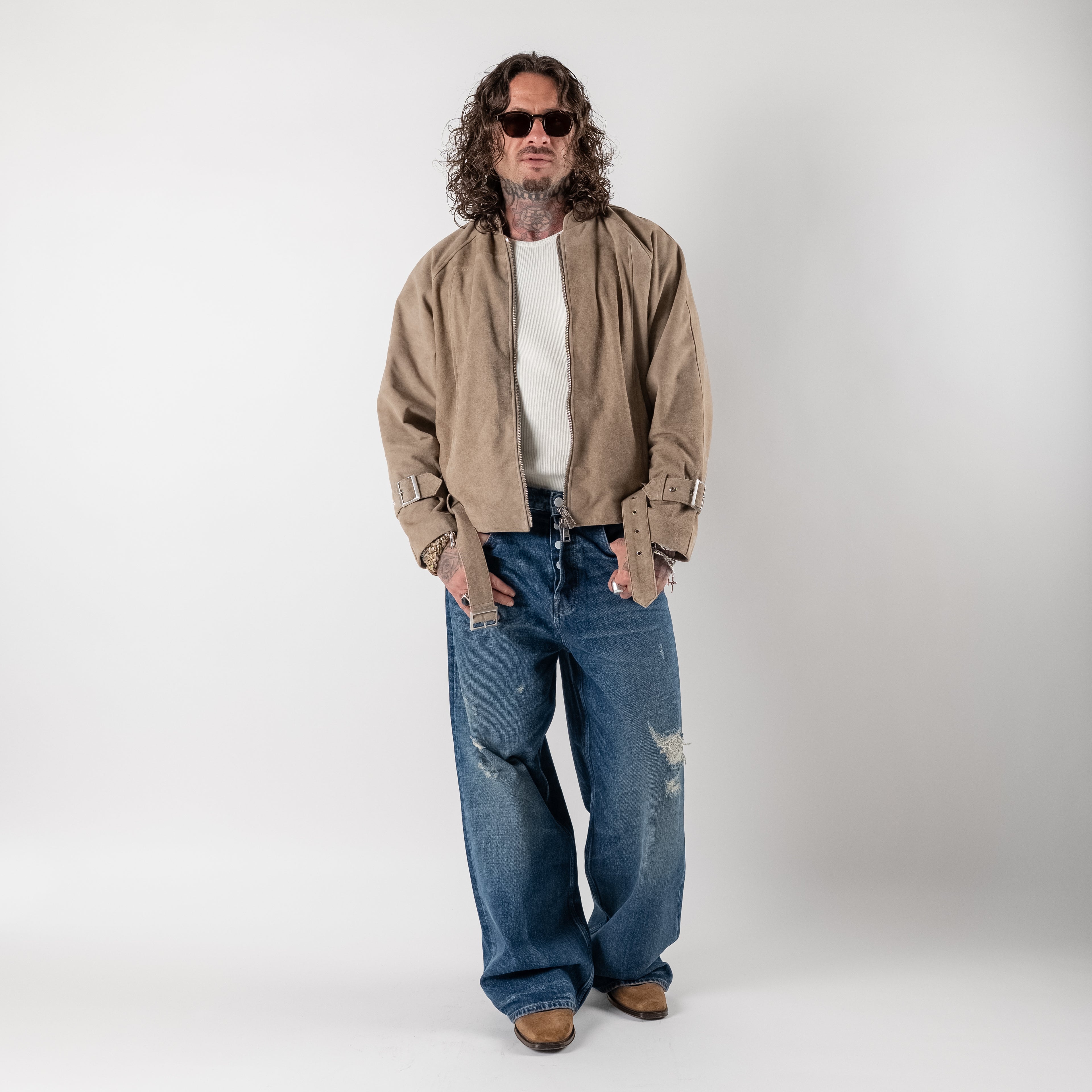 Cropped suede jacket with buckles