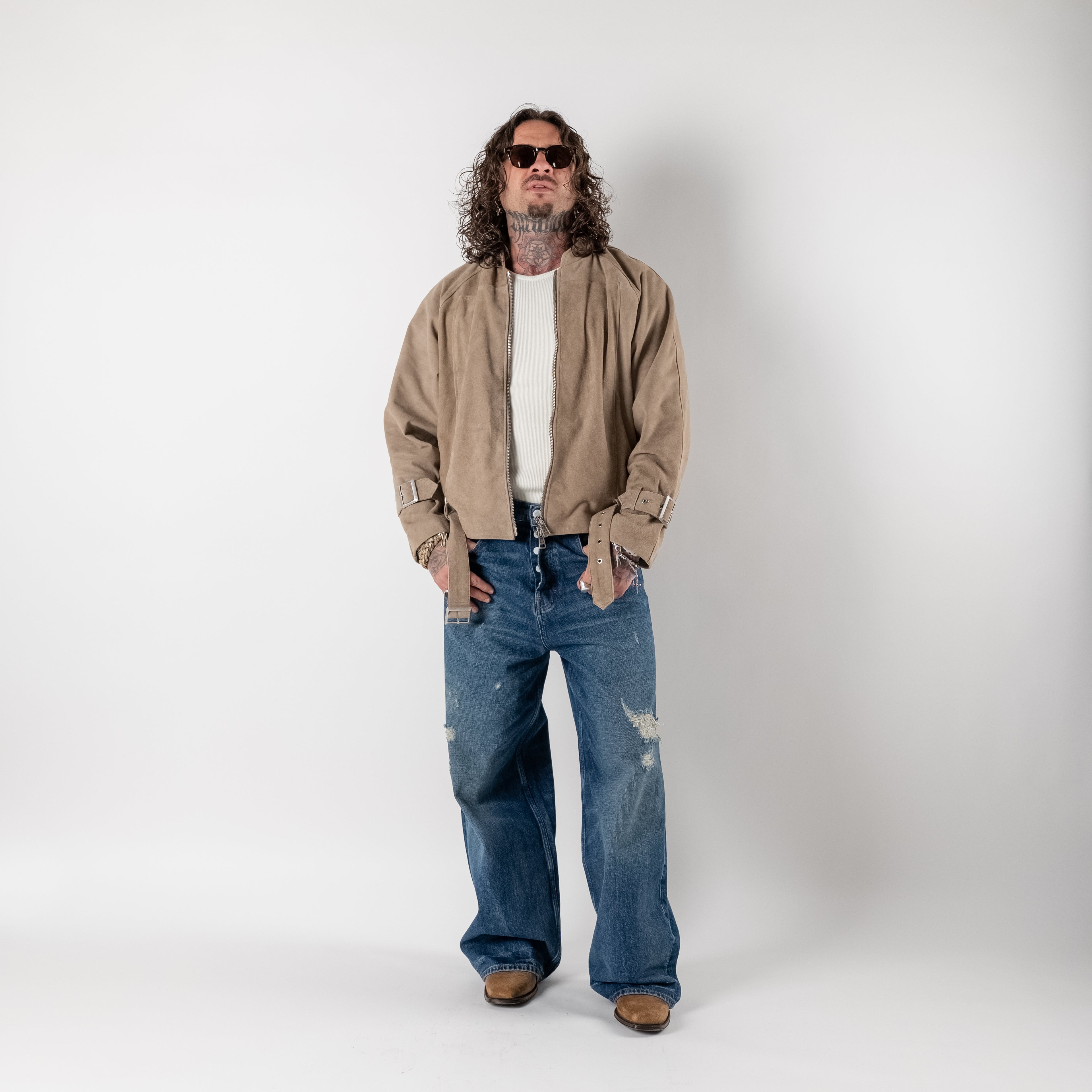 Cropped suede jacket with buckles
