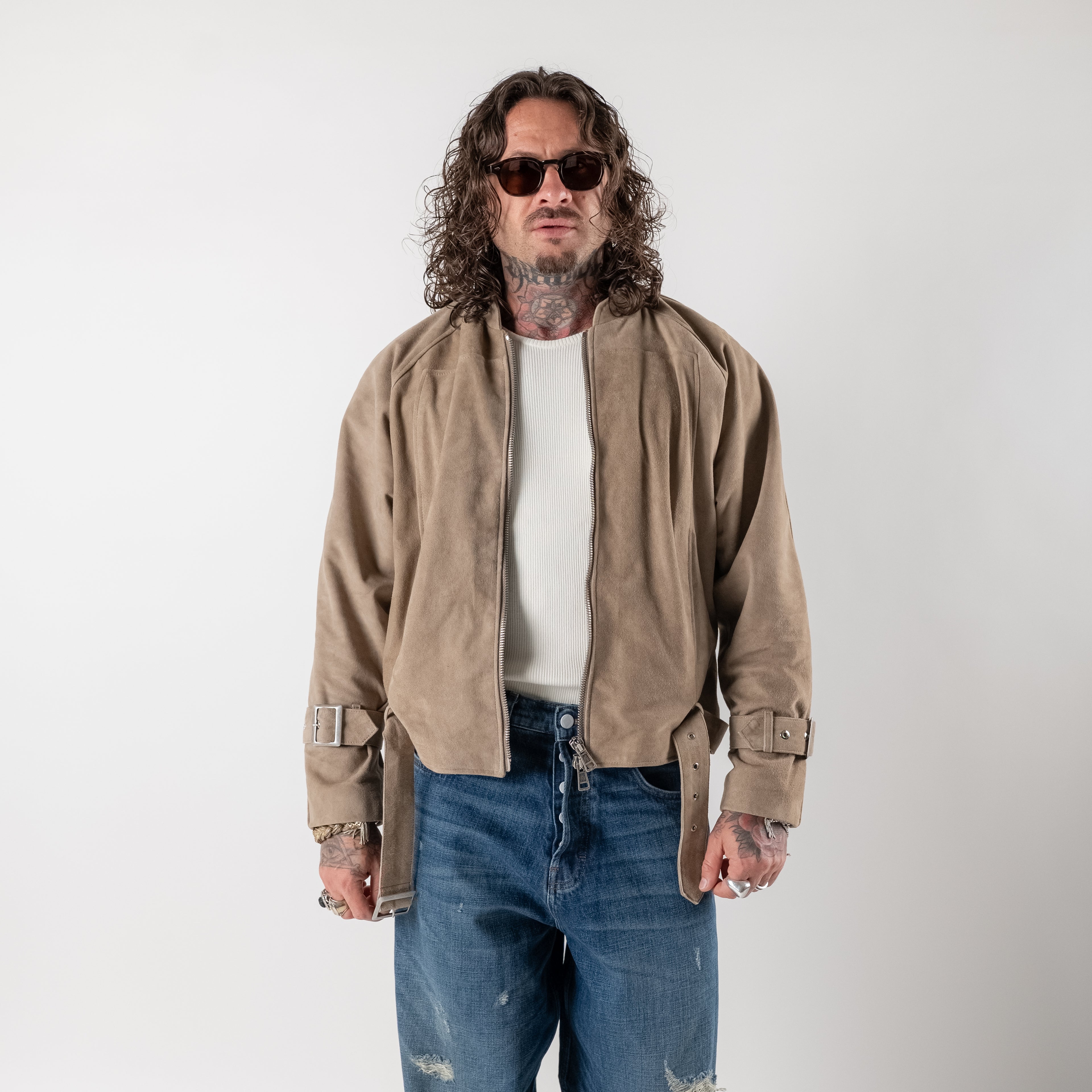 Cropped suede jacket with buckles