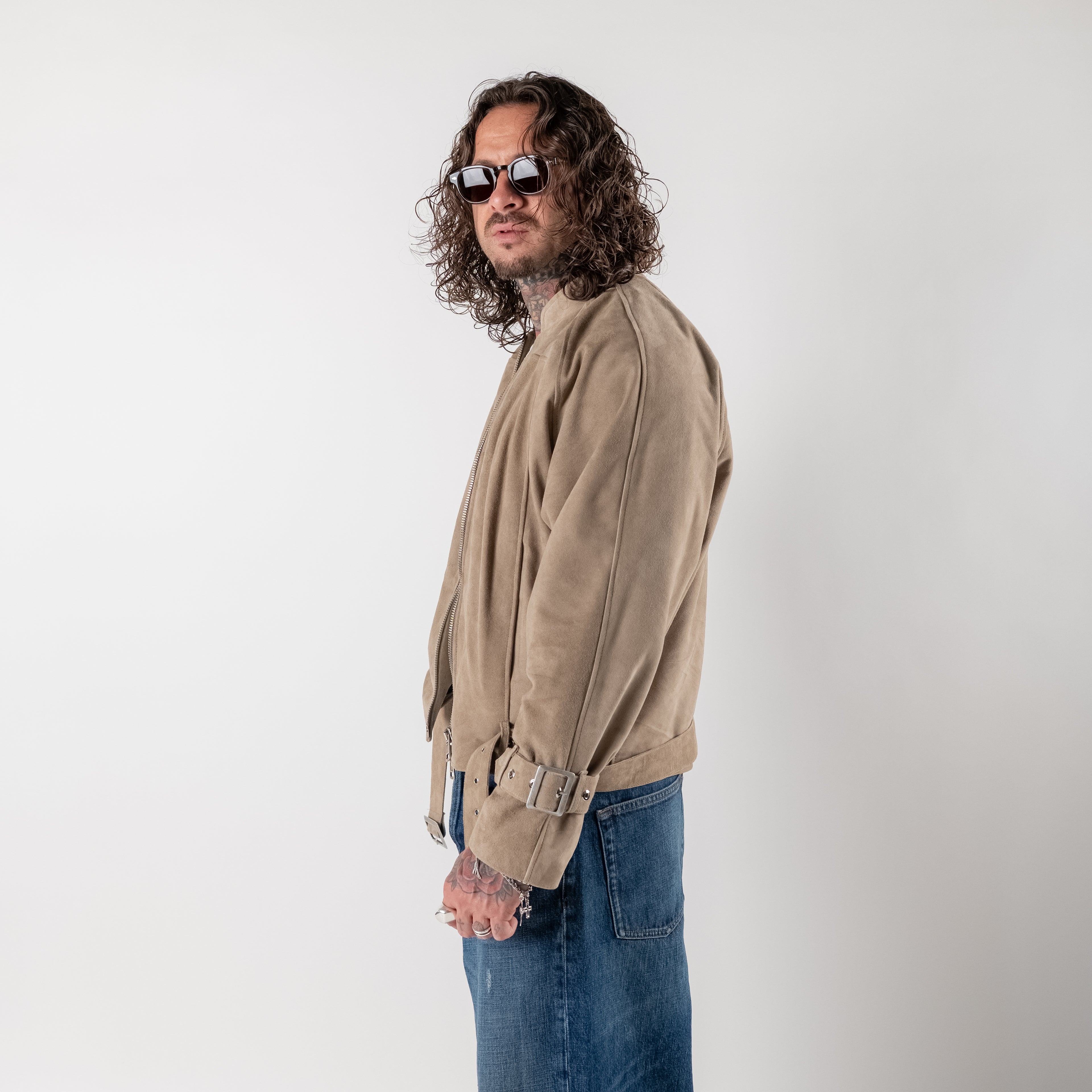 Cropped suede jacket with buckles