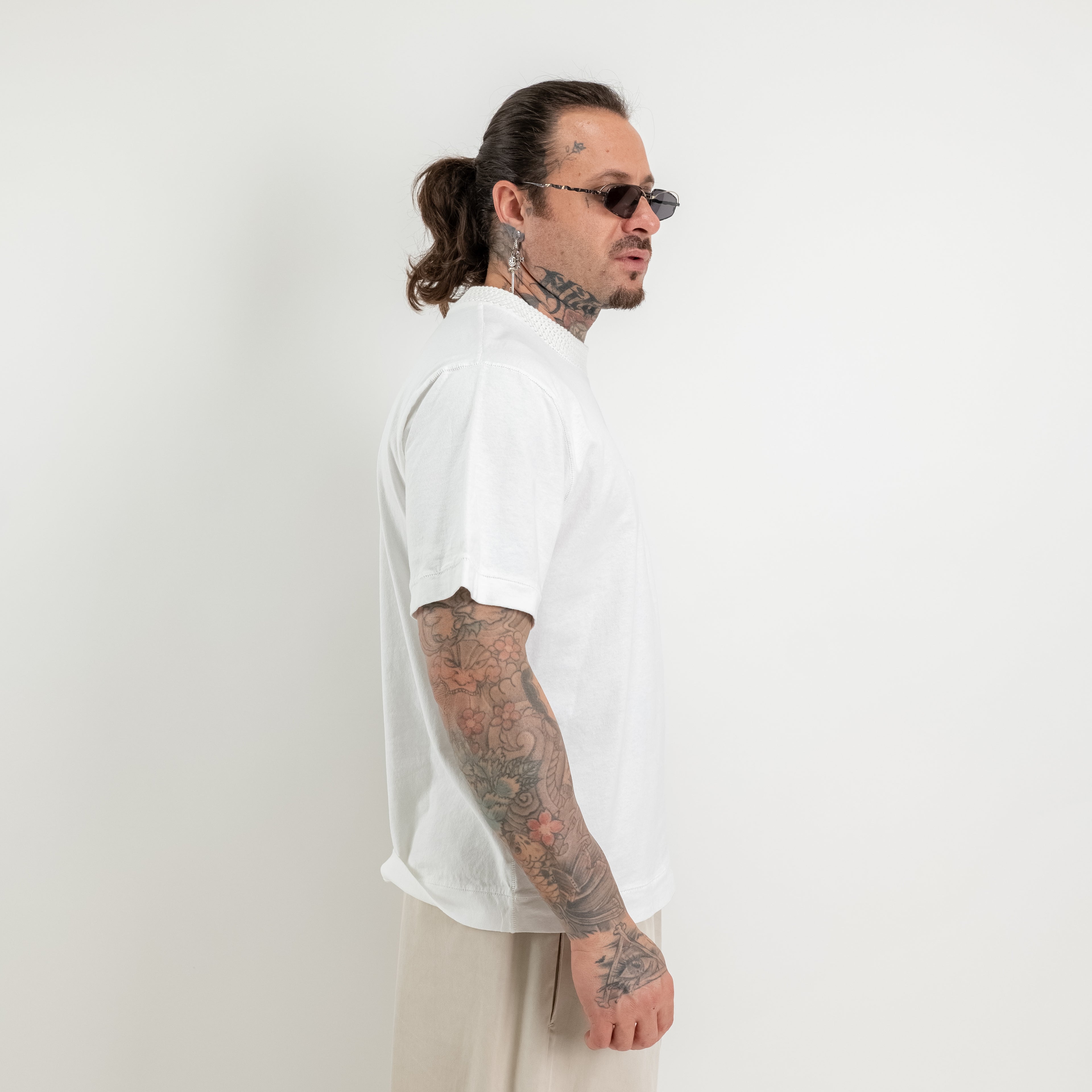 T-shirt con collo e taschino in maglia di cotone
