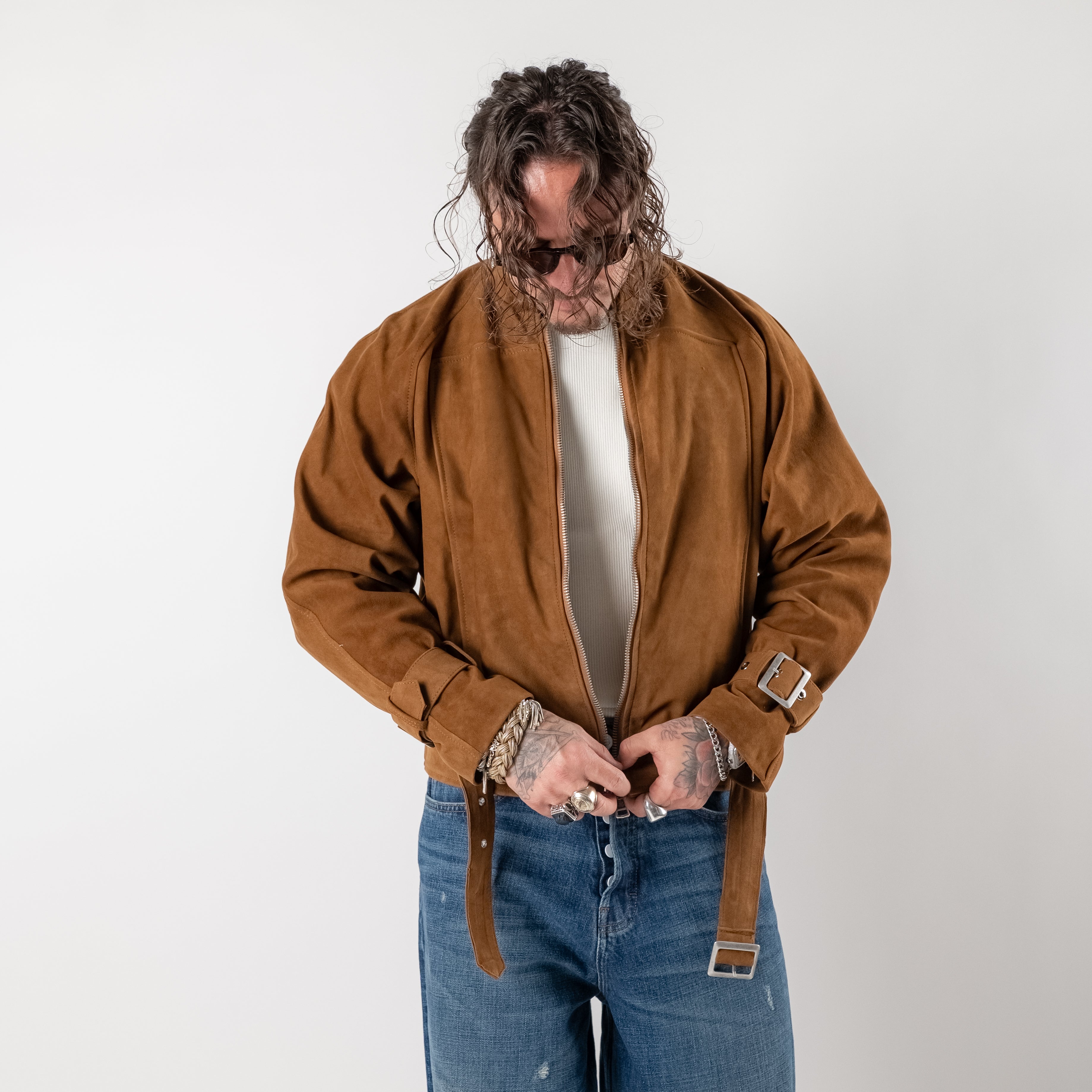 Cropped suede jacket with buckles