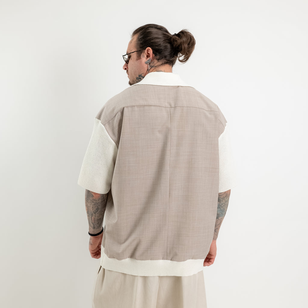 Polo oversize in fresco lana con collo e maniche in maglia di cotone