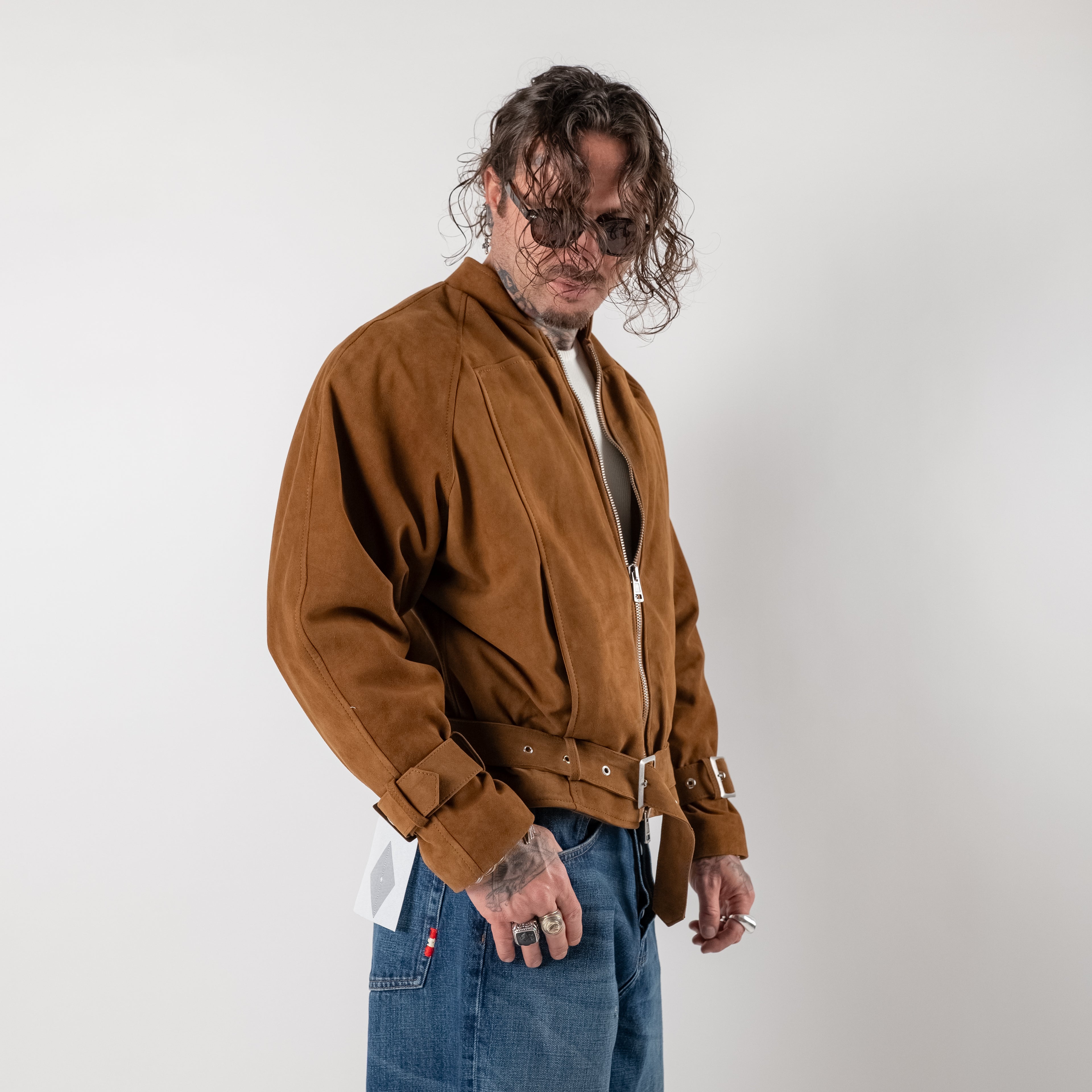 Cropped suede jacket with buckles