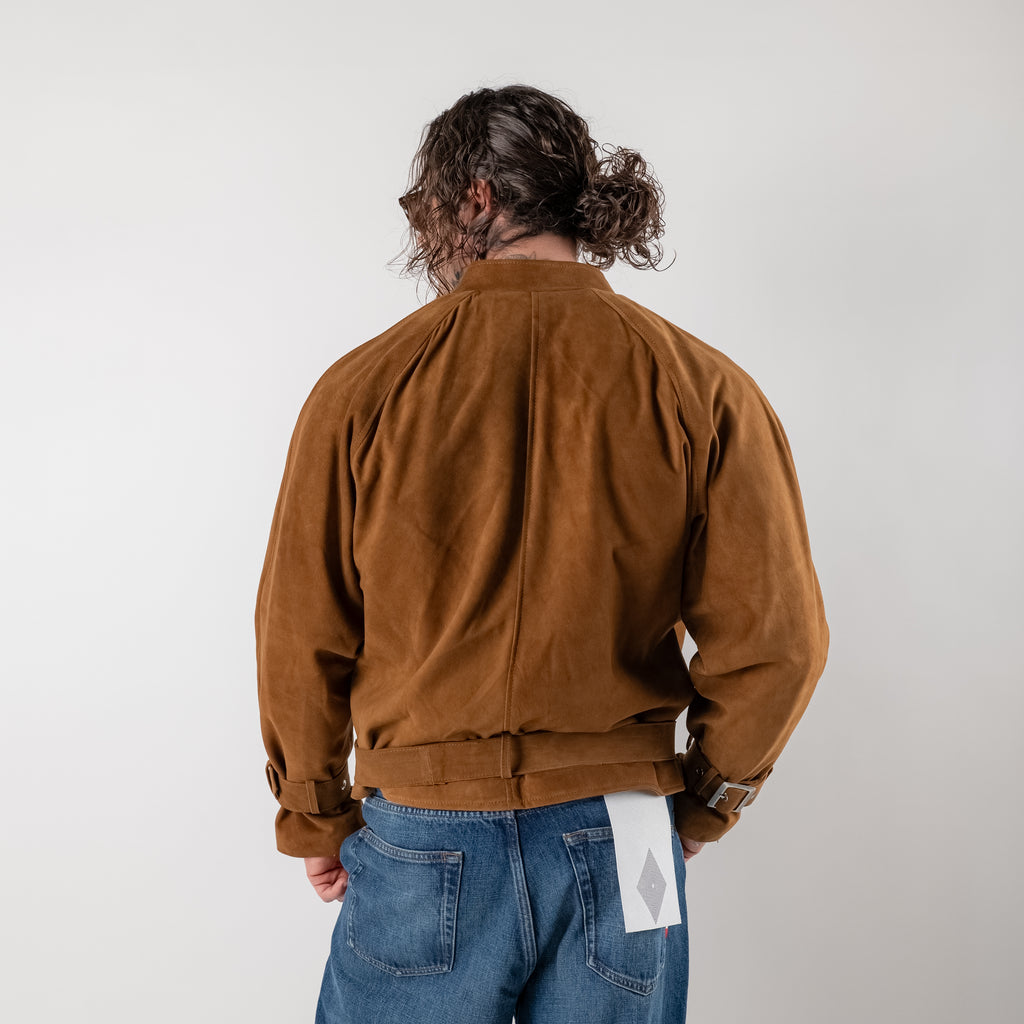 Cropped suede jacket with buckles