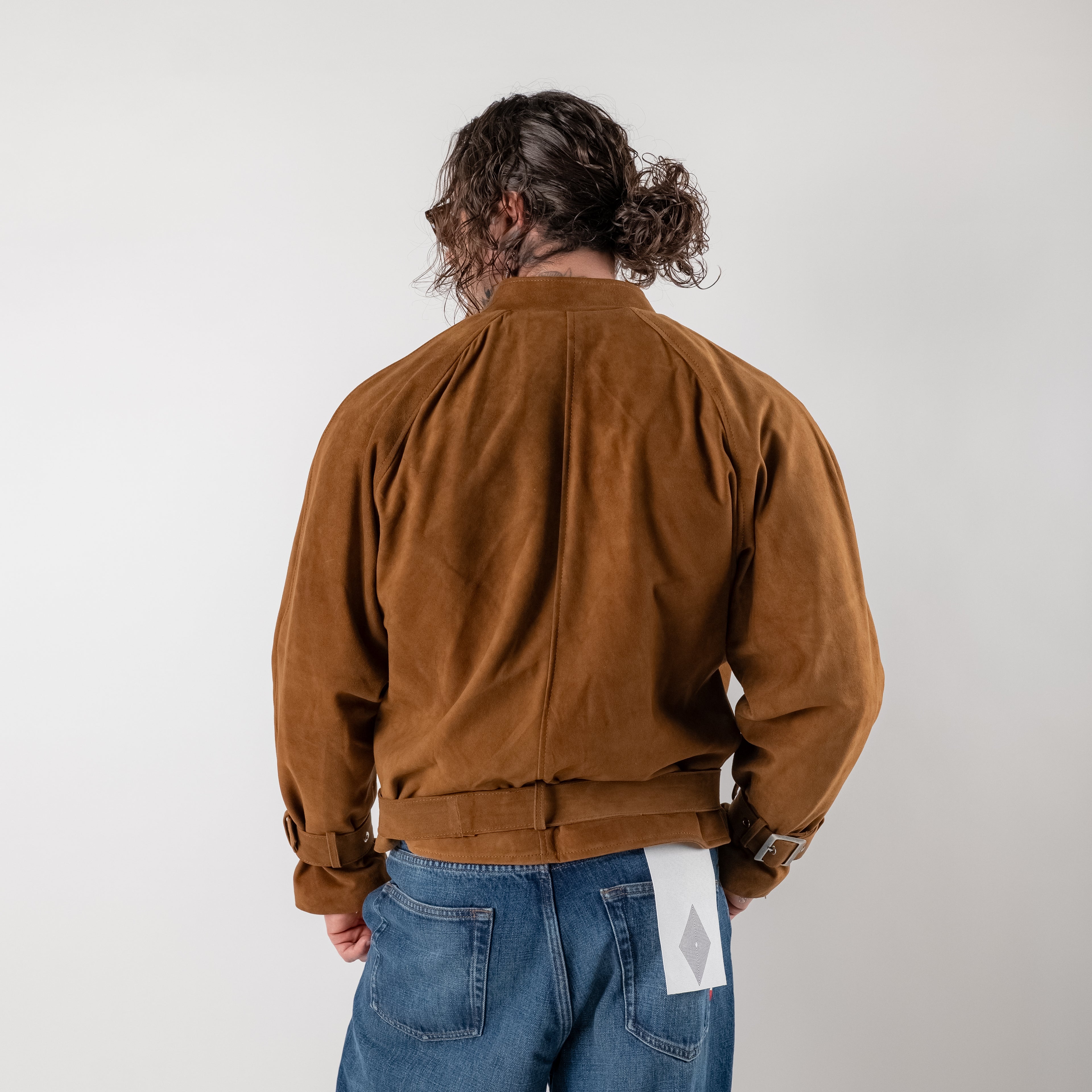 Cropped suede jacket with buckles
