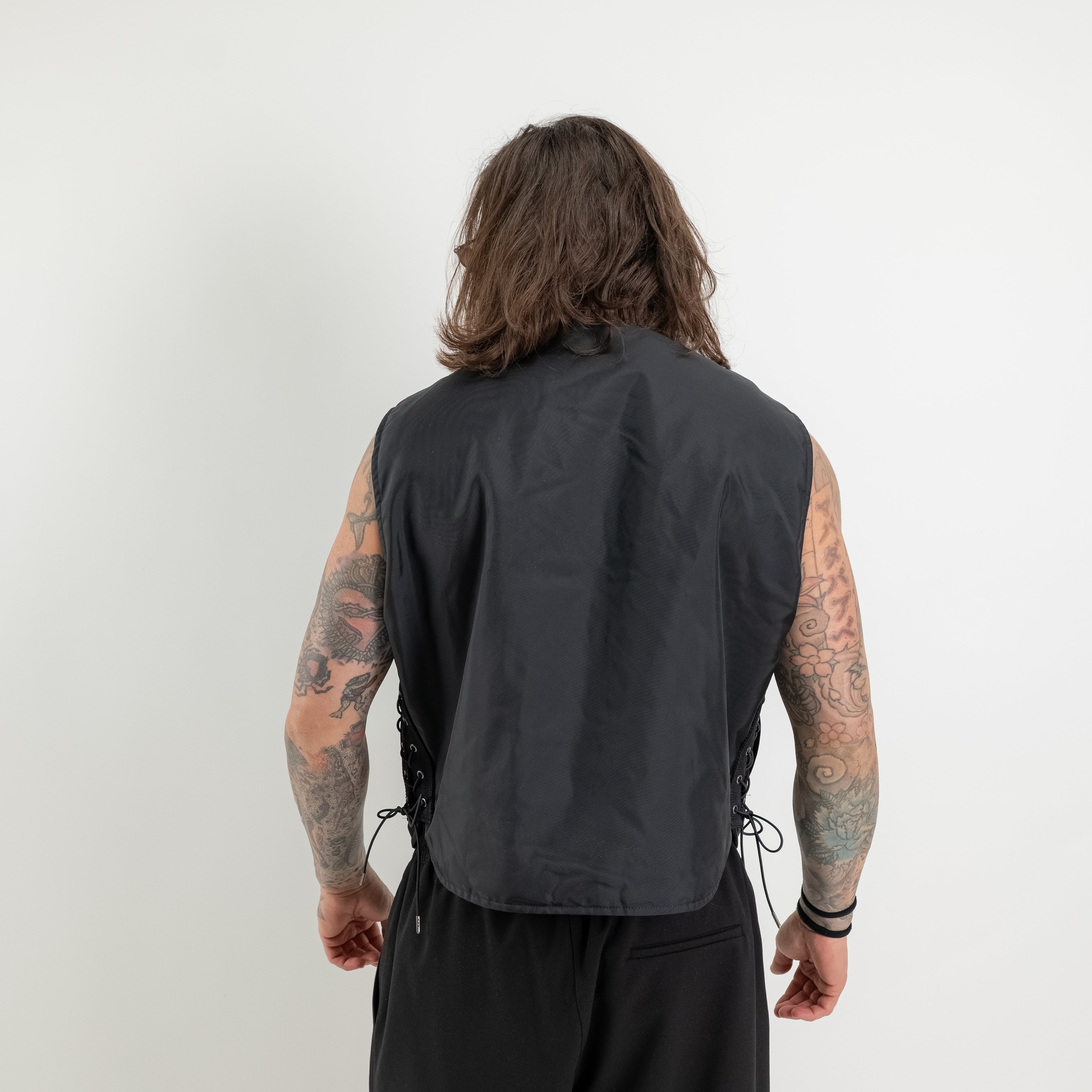 Gilet allacciatura con coulisse
