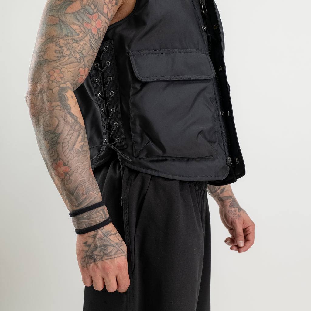 Gilet allacciatura con coulisse