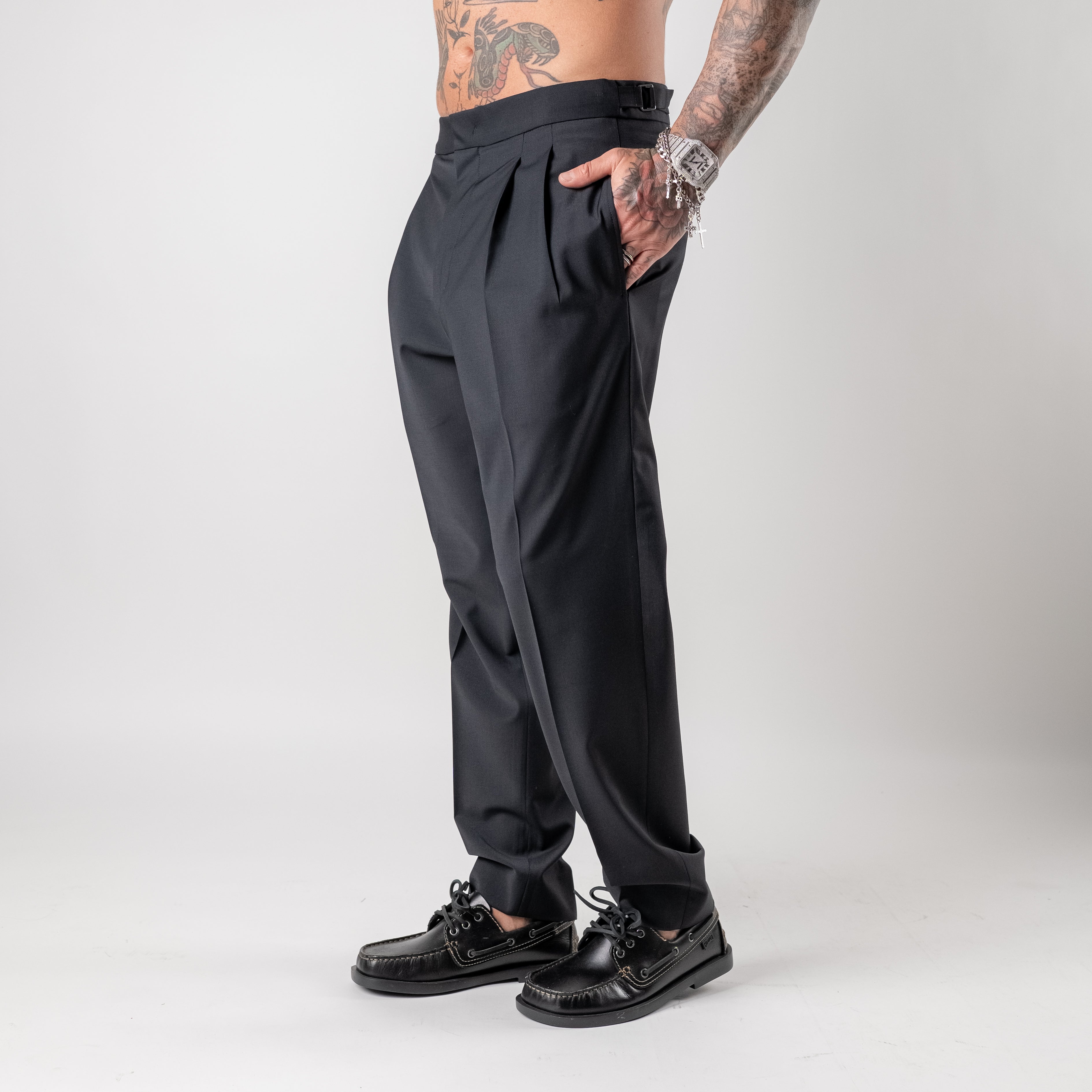 Double-pleated wool blend trousers with side buckle