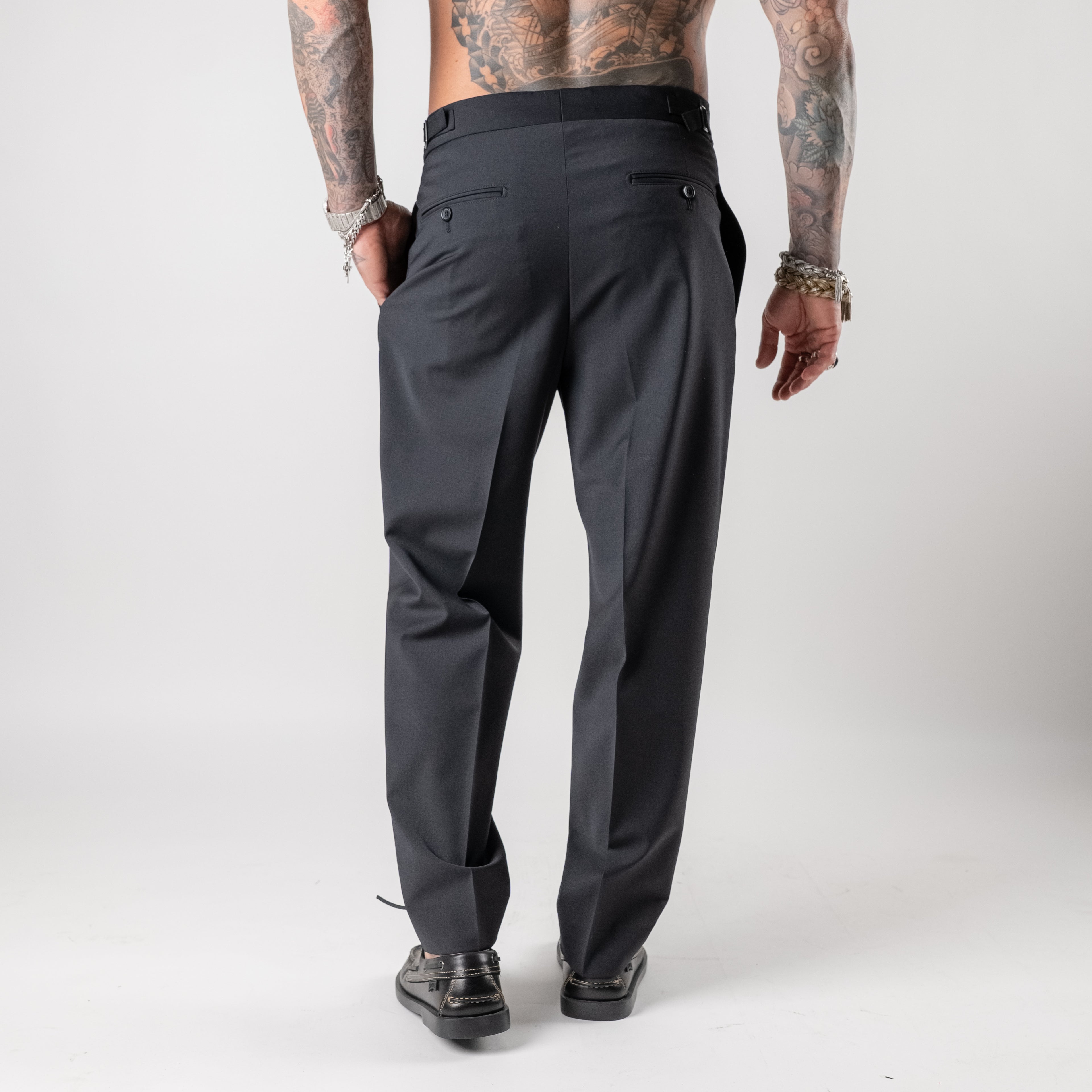 Double-pleated wool blend trousers with side buckle