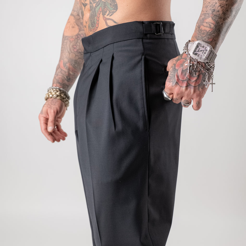 Double-pleated wool blend trousers with side buckle