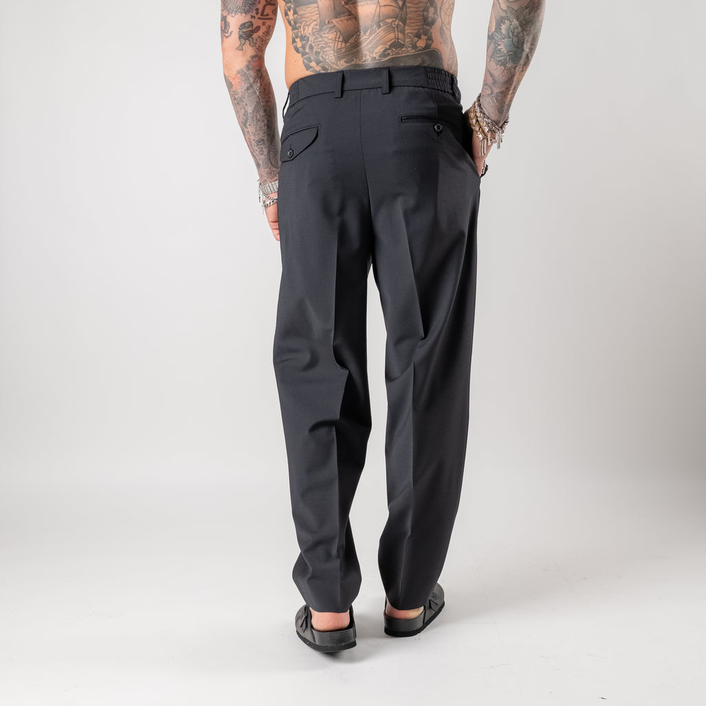 Double-pleated tailored trousers