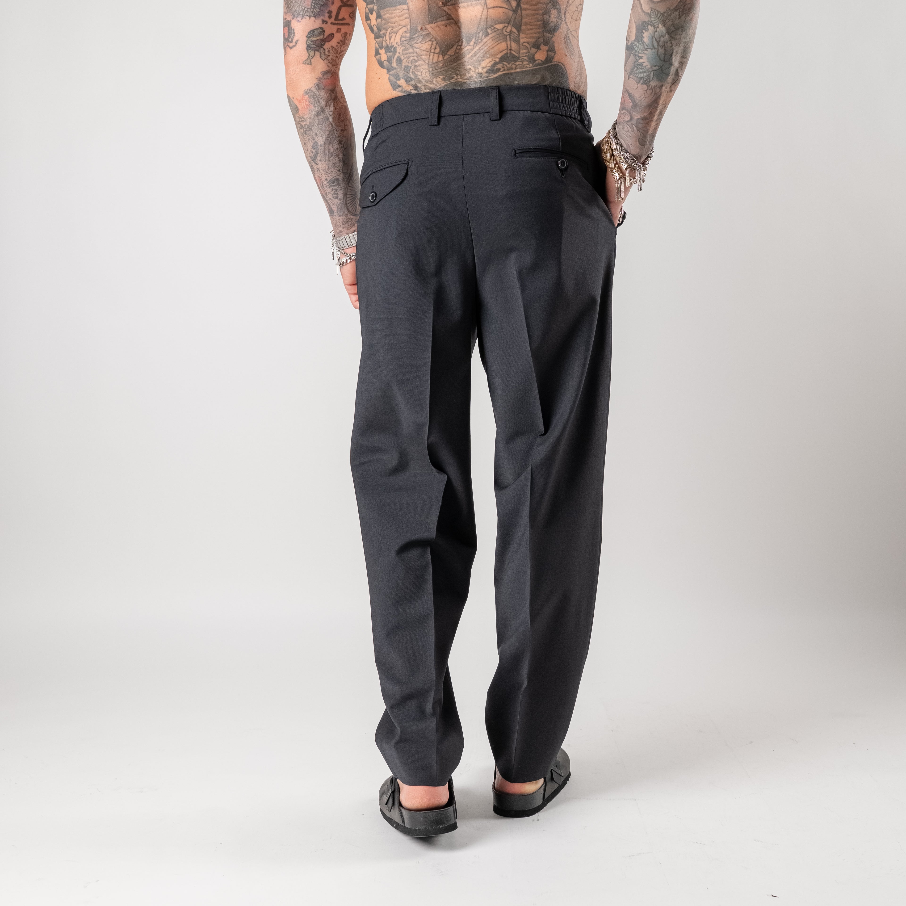 Double-pleated tailored trousers