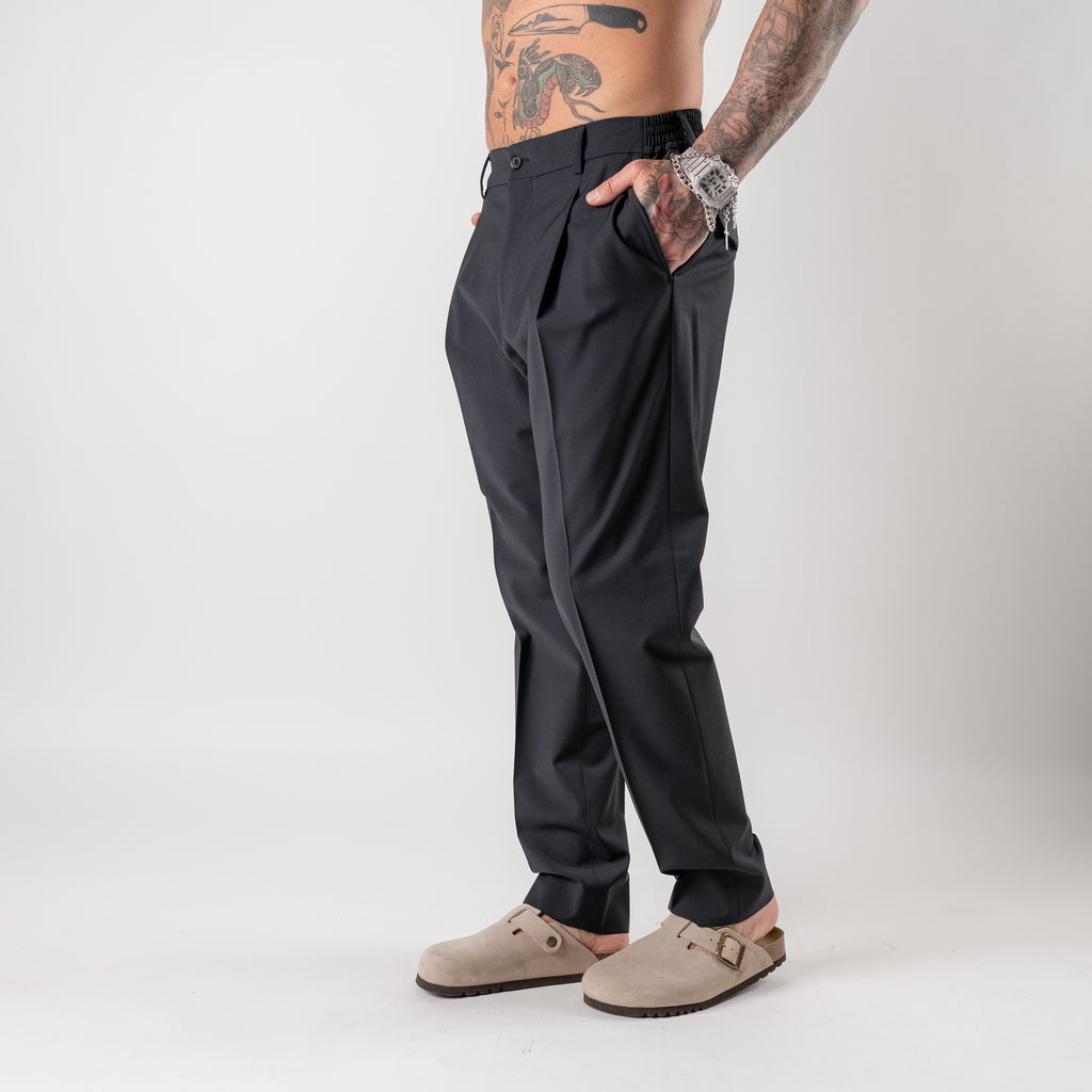 Regular trousers with half elasticated waist