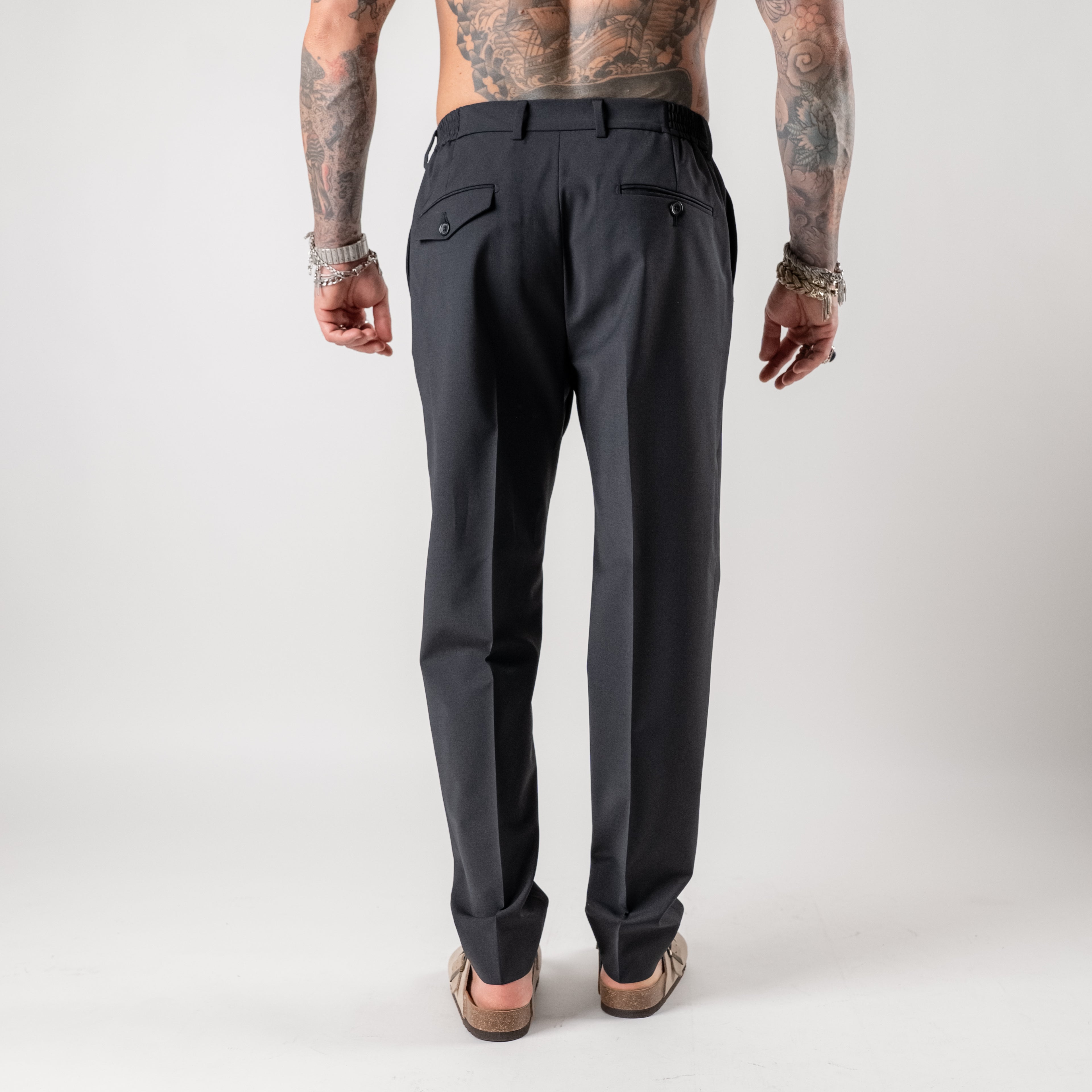 Regular trousers with half elasticated waist