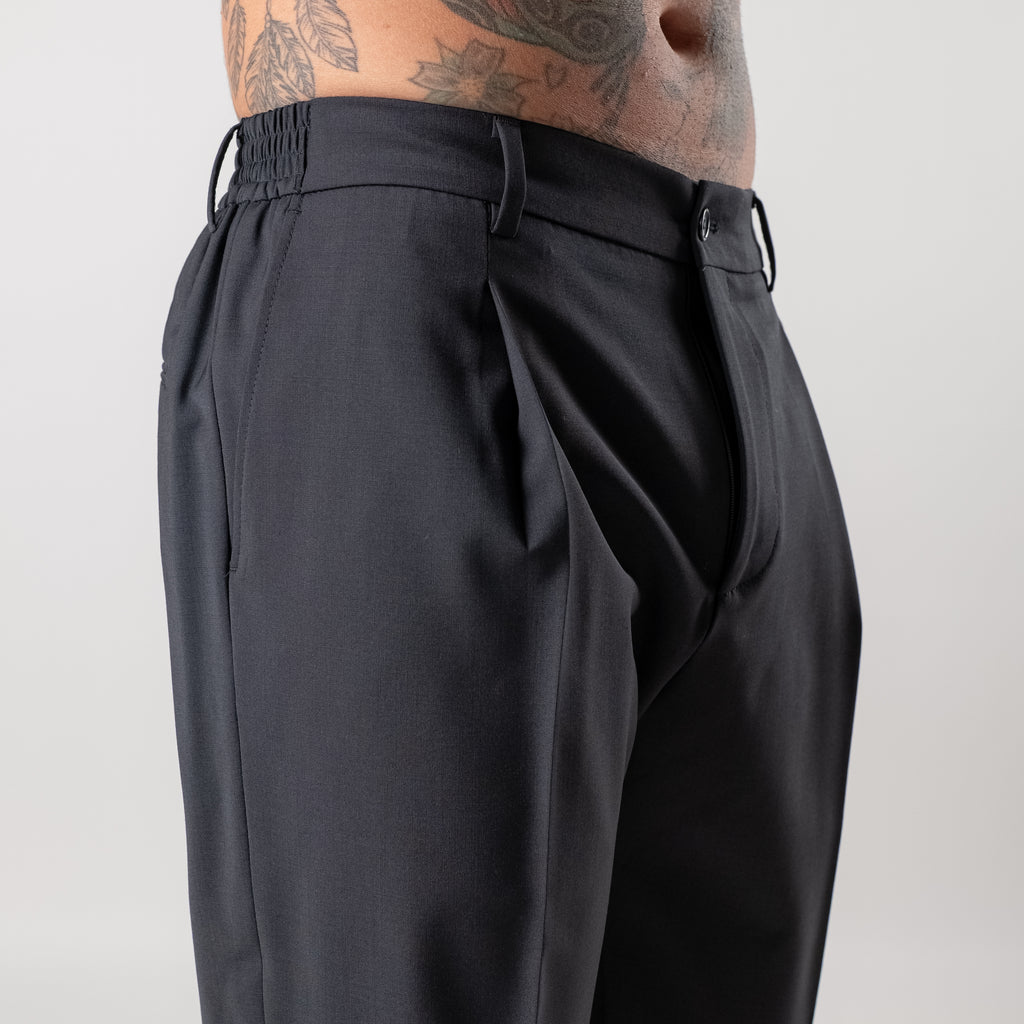 Regular trousers with half elasticated waist