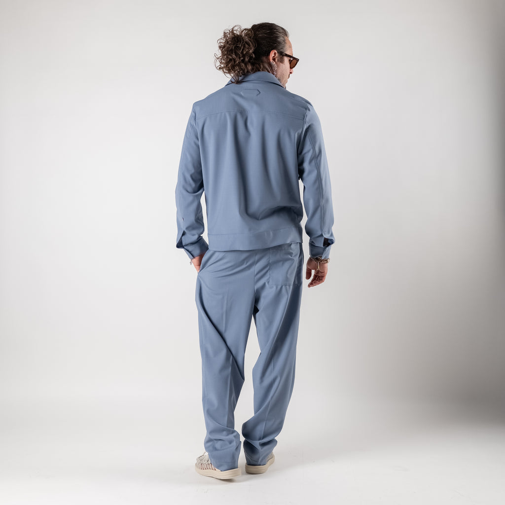 Pleated trousers with elasticated waist