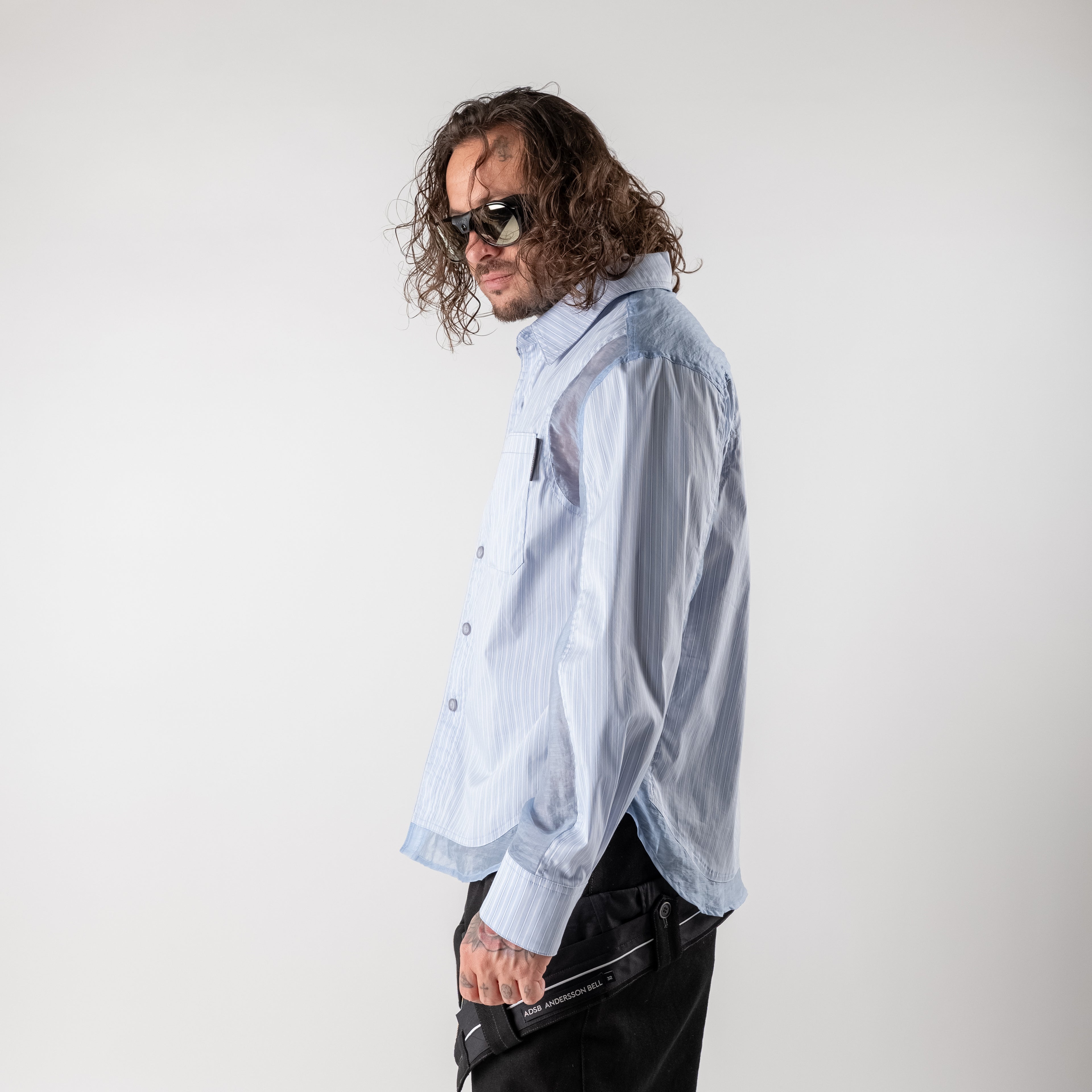 Striped shirt with organza panels