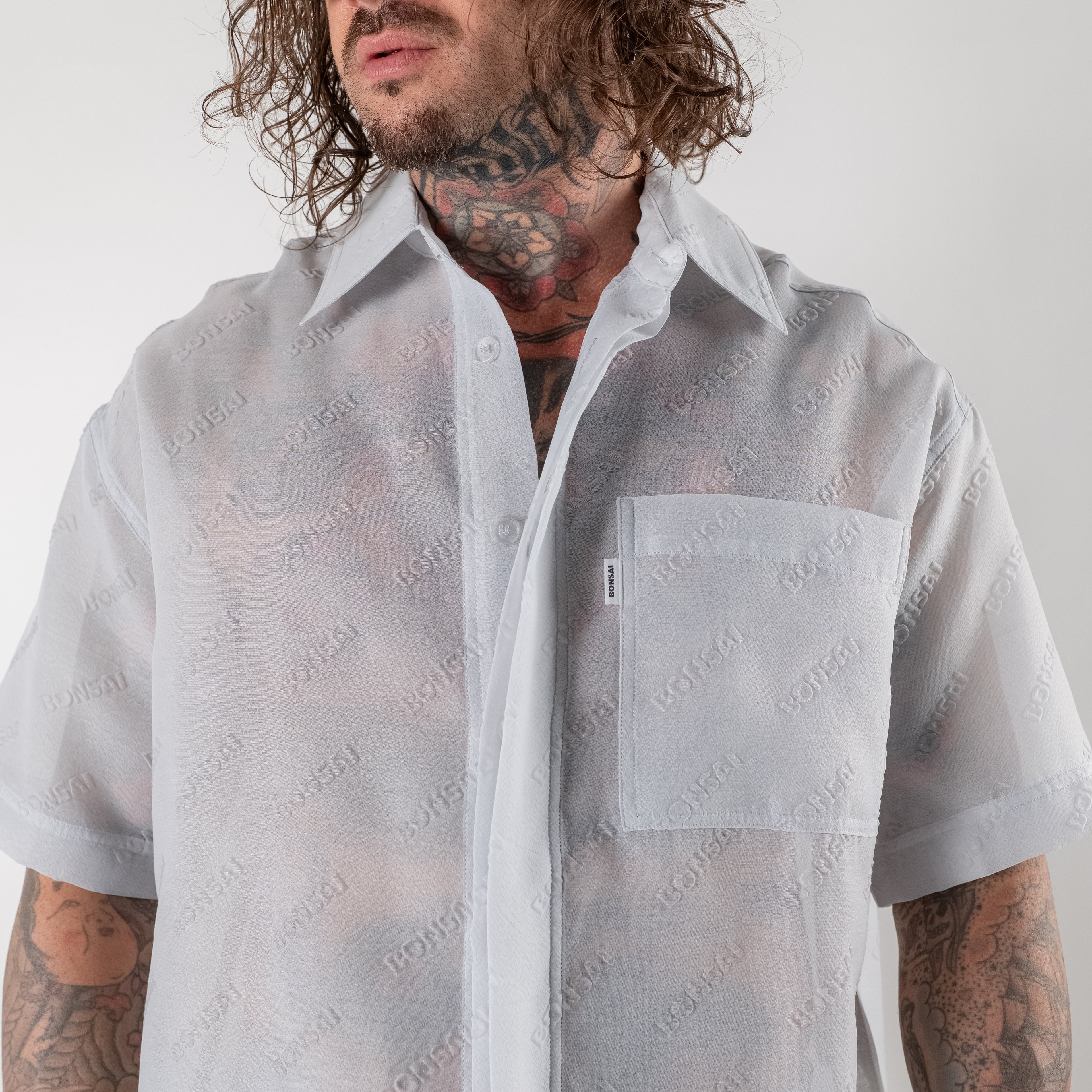 Oversized cropped shirt with logo