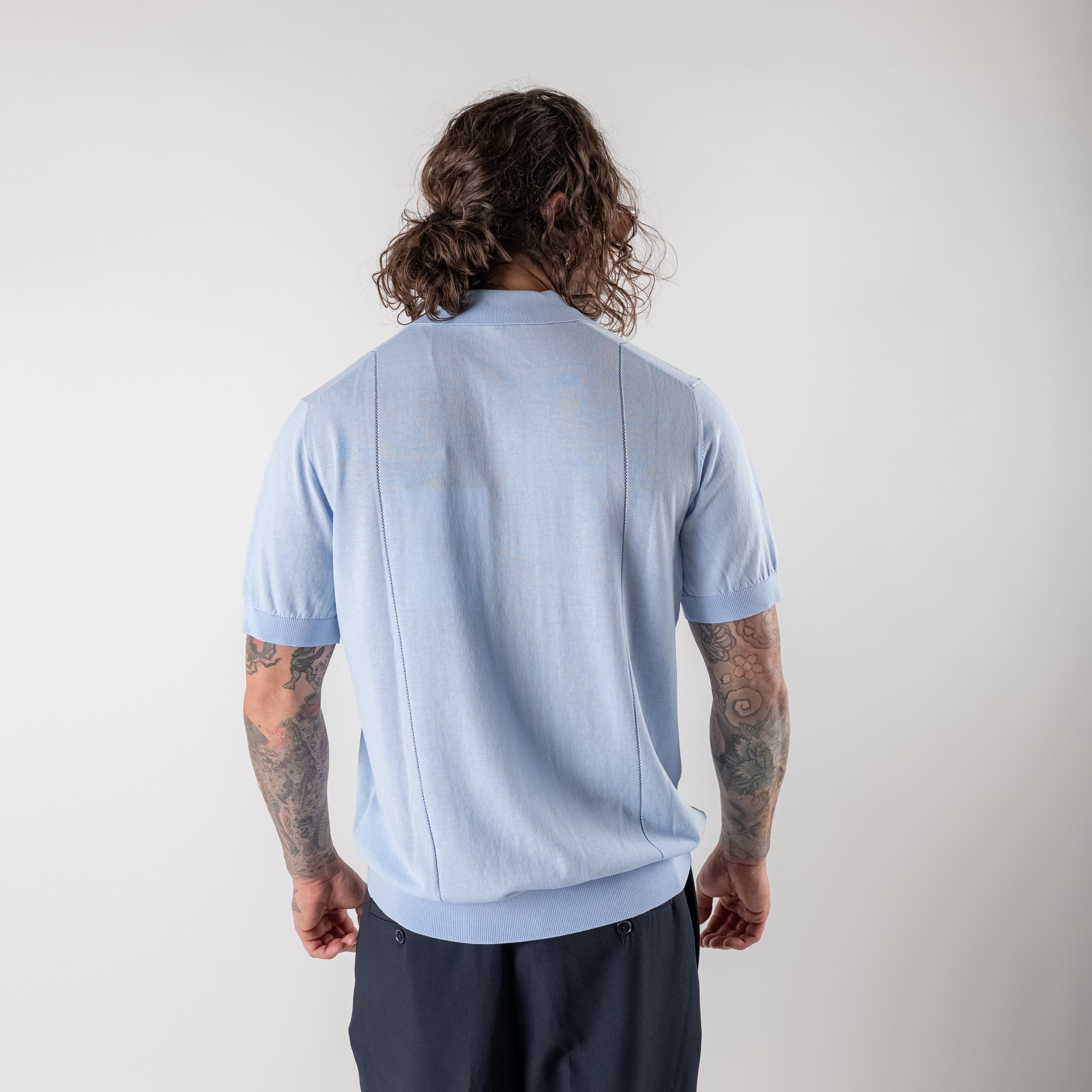 Polo with vertical seams
