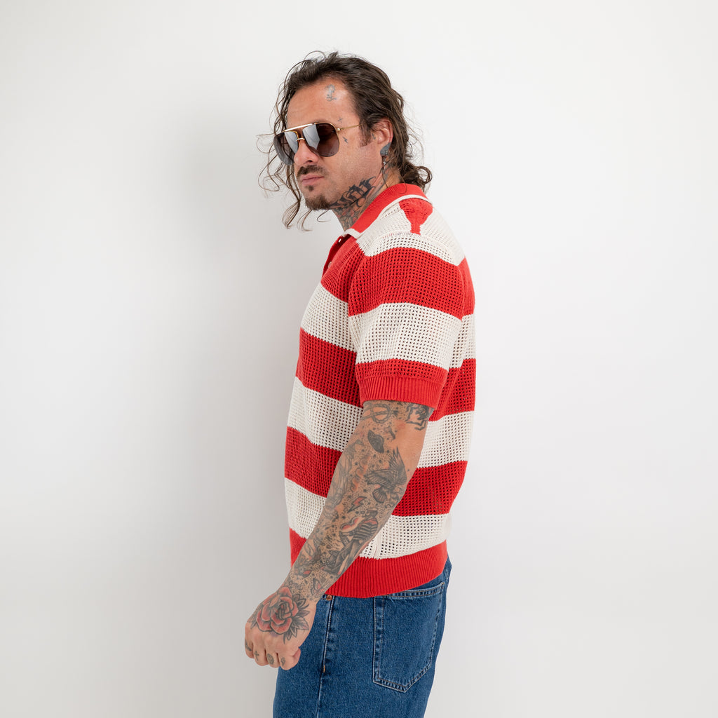 Polo in maglia traforata rigato