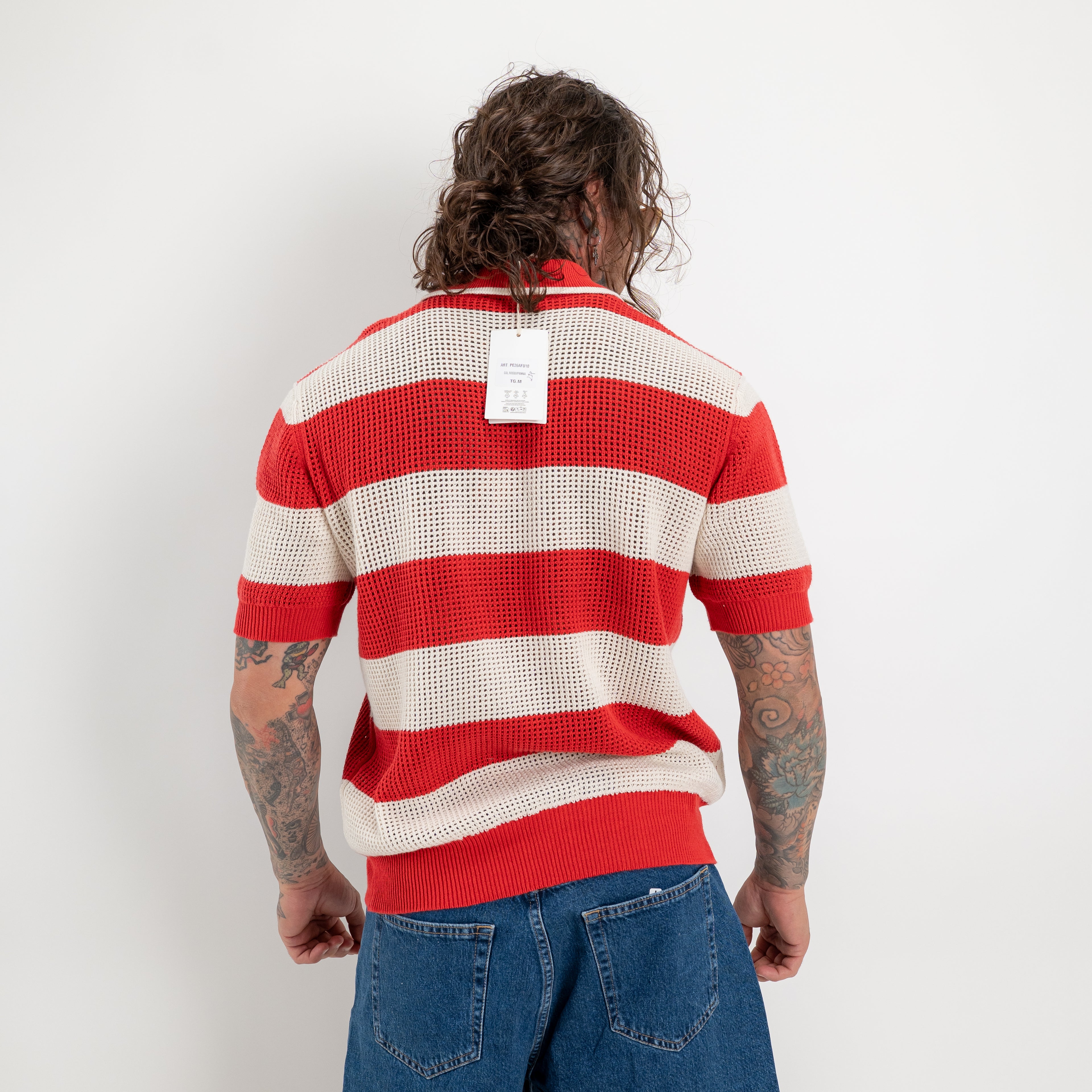 Polo in maglia traforata rigato