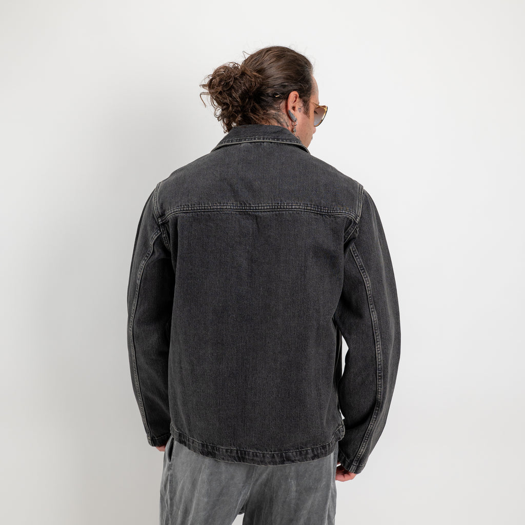 Giacca trucker in denim rigido
